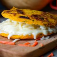 Carrot Arepa · Served with cheese.