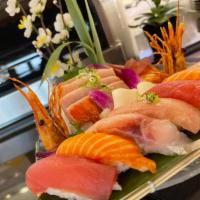 Sashimi Appetizer · 9 pieces of raw fish sashimi. 
