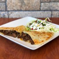 Classic Quesadilla with Meat · Our classic quesadilla features a fresh oversize flour tortilla stuffed with melted cheese a...