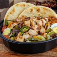 Mexican Chicken Salad · Tomato, pickle, cucumber, pita bread, dressing. Bell pepper and onions are grilled with the ...