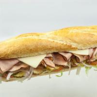 Ham and Swiss Sandwich · Lots of smoked ham and Swiss cheese on a rustic french baguette with mayo, mustard, lettuce,...