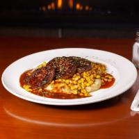 Housemade Meatloaf · Mashed potatoes, buttery corn, mushroom gravy.