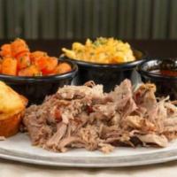 Pulled Pork BBQ Dinner · Served with choice of sauce, 2 sides and cornbread.