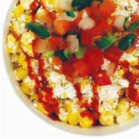 ELOTE · Elote is made with corn on the cob, slathered with mayonnaise, seasoned with chili powder an...