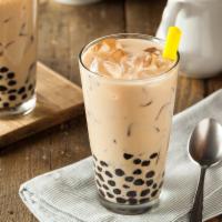 Iced Milk Tea With Boba · A refreshing milk tea with chewy tapioca balls. Comes in a 16oz cup.