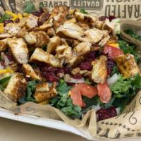 Grilled Chicken Kale Salad Special · Fresh kale topped with cranberry, pecans bacon bits, and grilled chicken.