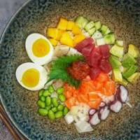 Tuna-Salmon Bowl	 · Tuna and salmon cubes, sesame seeds, mango, avocado, cucumber, and edamame.
