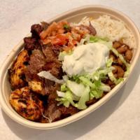 Mixed Kebab Bowl · Steak tip ,grilled chicken, shawarma with rice, pinto beans lettuce, pico de gallo and sour ...