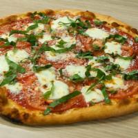 Margherita Gluten Free Pizza (Medium Size only) · Saucy red, fresh mozzarella, pecorino Romano tomato, basil. Vegetarian. Vegan upon request.