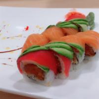 M26. Tokyo Roll · 8-10 pieces. Crunchy spicy salmon and tobiko roll with tuna, salmon and avocado on top.