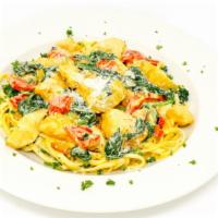 Chicken Vegatali · Sauteed chicken with artichoke hearts, spinach, roasted red peppers and fresh garlic in crea...
