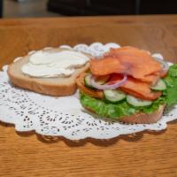 Smoked Salmon Sandwich · Cream cheese, lettuce, cucumber, tomato, red onion, cilantro.