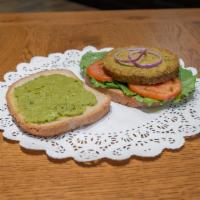 California Vegie Sandwich · Veggie burger, lettuce, tomato, cucumber, guacamole, red onion.