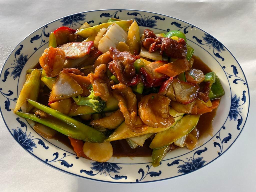 Happy Family · Large A combination of shrimp, beef, chicken and pork with snow peas, water chestnuts, bamboo shoots and broccoli covered in a brown sauce. Comes with fried rice and fortune cookie. 
