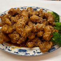 Sesame Beef · Crispy fried beef tossed in a sweet and spicy sesame sauce. Hot and spicy. Comes with fried ...