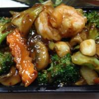 Shrimp and Scallop in Garlic Sauce · Jumbo shrimp and scallop sauteed with vegetables. With spicy garlic sauce. Served with steam...
