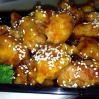 Sesame Chicken · Served with steamed rice. 