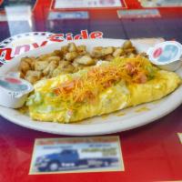 Taco Omelet · Beef, lettuce, tomato, and cheddar topped with sour cream. Made with 3 eggs and cheese. Serv...