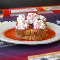 Stuffed French Toast Breakfast · Banana, blueberry, or strawberry on 2 texas French toast and topped with whipped cream.