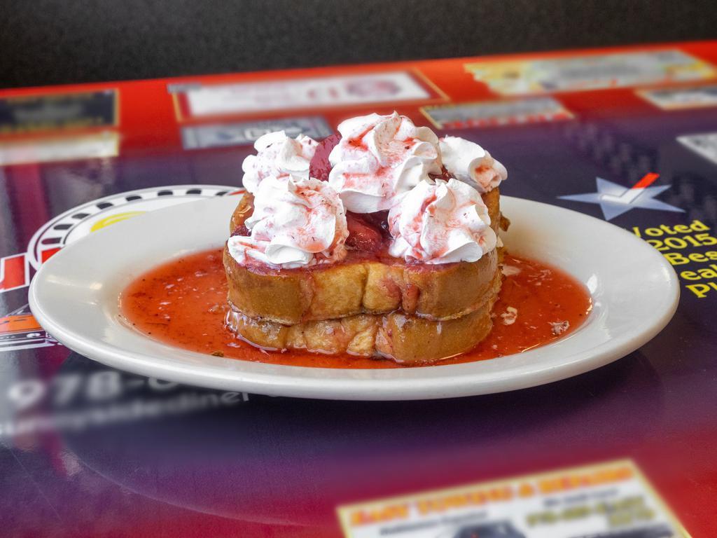 Stuffed French Toast Breakfast · Banana, blueberry, or strawberry on 2 texas French toast and topped with whipped cream.