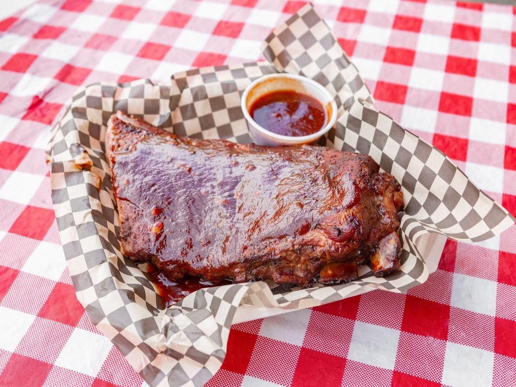 Trail Pack · 1/2 rack spare ribs. Choice of 8 oz. meat and two 8 oz. sides.