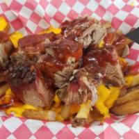 Cowboy Fries · Pork, cheese and BBQ sauce.