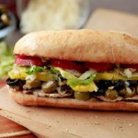 Veggie Sub · Includes grilled onions, green peppers, mushroom, black olives and tomato sauce.