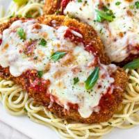 Chicken Parmigiana Pasta · Breaded chicken breast drizzled with our homemade tomato sauce and mozzarella cheese, served...