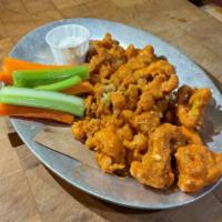 Buffalo Cauliflower · Our fried cauliflower, vegan ranch, celery & carrots