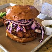 Fried Chicken Sandwich · Buttermilk Fried Chicken, Coleslaw, House Pickles, Red Onion, Dijon Aioli on a Brioche Bun. ...