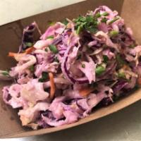 Coleslaw · Cabbage tossed in a zippy horseradish dressing