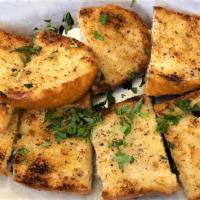 Garlic Bread · Toasted garlic French bread.