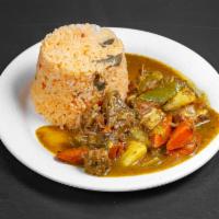 Curry Goat  · Spiced sauce.