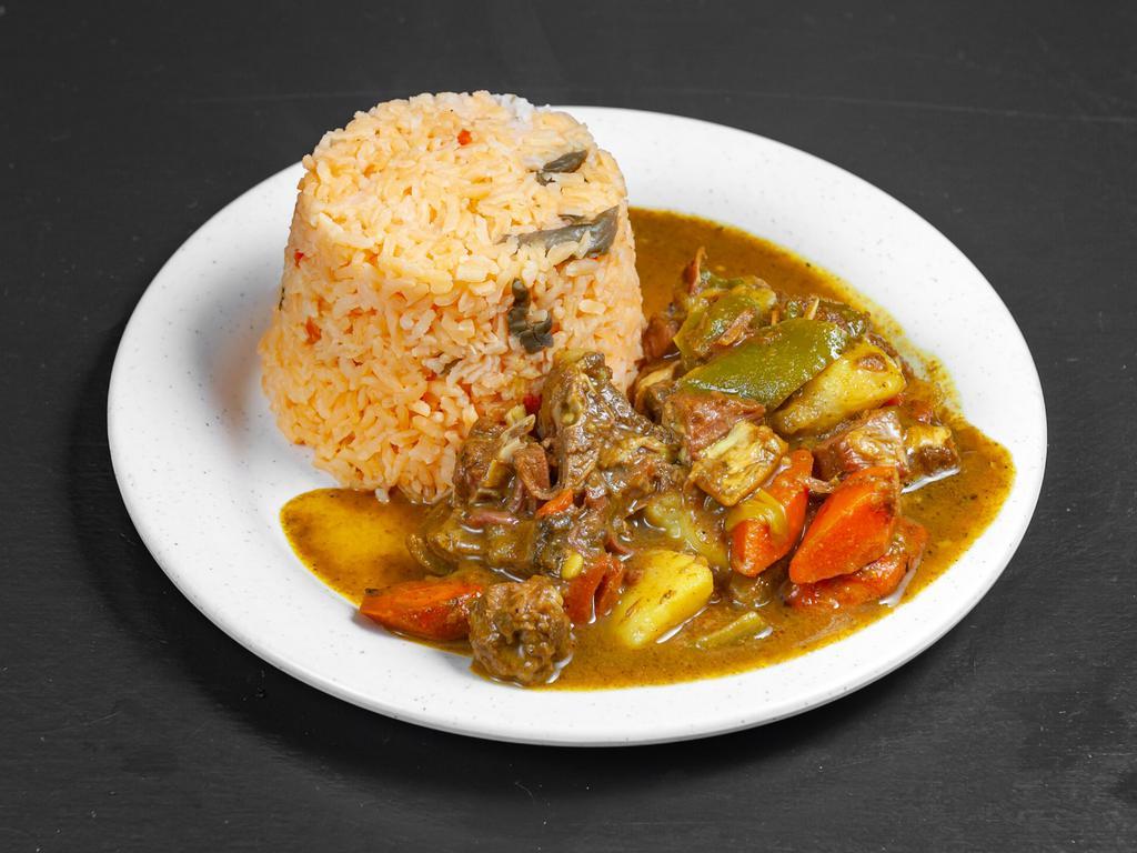 Curry Goat  · Spiced sauce.
