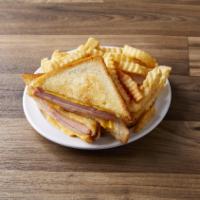Grilled Ham and Cheese Sandwich · Served with lettuce, tomato and french fries.