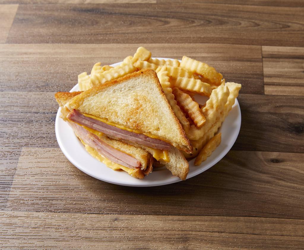 Grilled Ham and Cheese Sandwich · Served with lettuce, tomato and french fries.