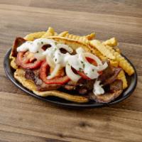Gyros Sandwich Plate · Served on pita bread with tomatoes, onions, tzatziki sauce and french fries. Served with let...