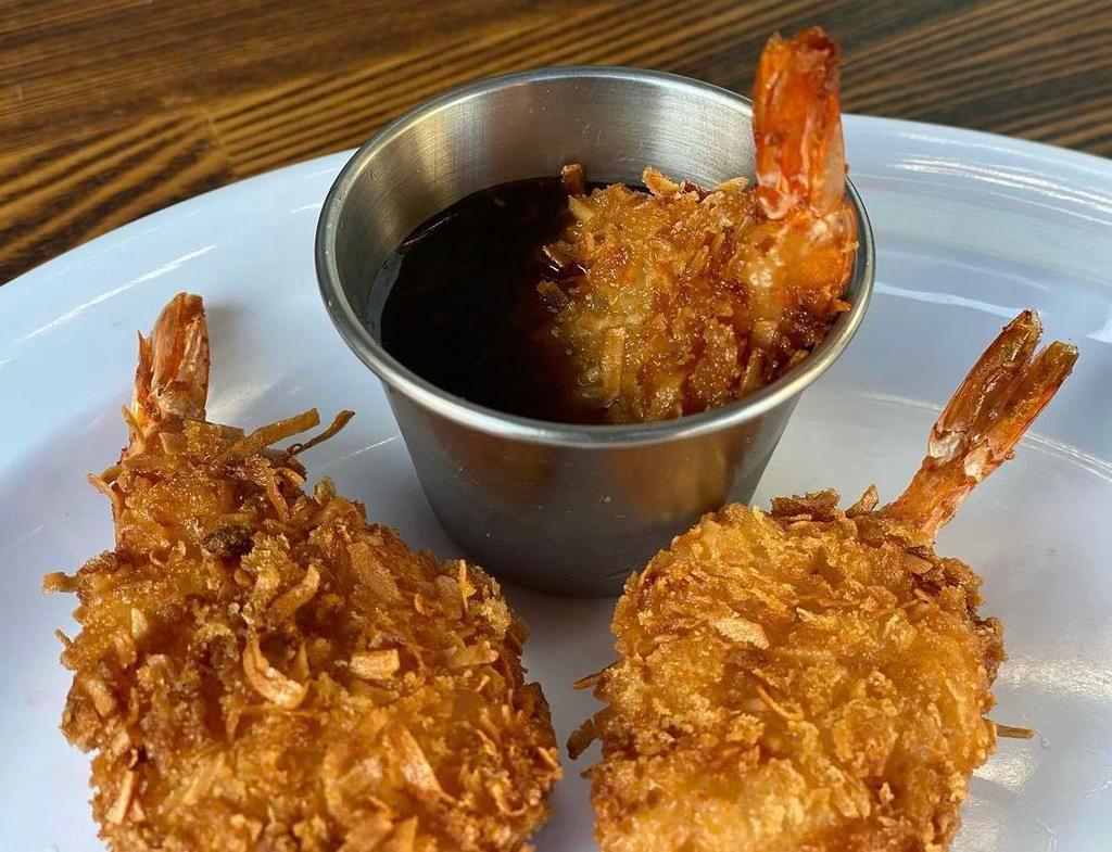 Coconut Shrimp  · 12 perfectly  breaded butterfly shrimp with honey sesame sauce dipping sauce. 