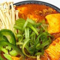 Soondubu-jjigae · Silk tofu, anchovy broth, with pork belly and enoki mushrooms. Comes with rice and banchan