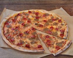 Triboro Red Pie · Flippin' Pizza sauce, 100% whole milk mozzarella, pepperoni, sliced meatballs and sausage.