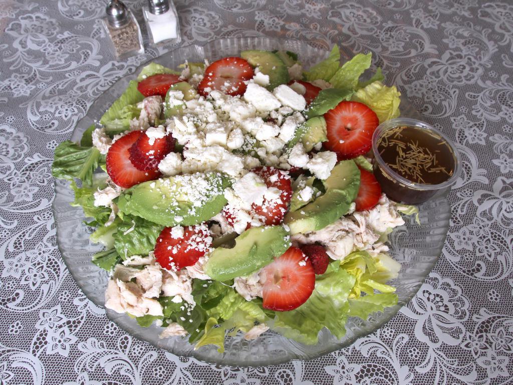 Strawberry Avocado Salad · Fresh strawberries, avocado, chicken and feta cheese on top of fresh cut romaine, served with balsamic vinaigrette.
