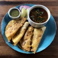 Birria Tacos · Four Corn Tortilla Tacos stuffed with Braised Beef, Cheese, Onion and Cilantro. Served with ...