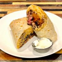 Burrito · Flour Tortilla filled with Spanish Rice, Black Beans, Cheese, Salsa, Sour Cream, and Your Ch...