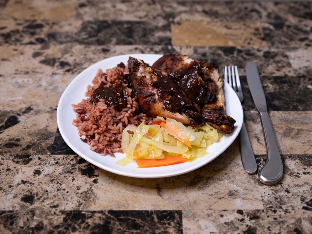 Jerk Chicken Dish · Chicken marinated in special seasoning and jerk sauce.
Served with Rice n Peas and Veggies 