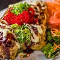 Sticky Balls · Tuna, crab and Sriracha rice in a tempura fried inari pocket, topped with scallions, wasabi ...
