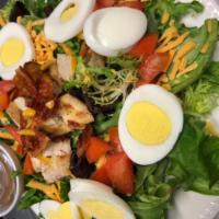 Cobb salad · Spring mix,diced bacon,avocado,tomatoes,shredded chedda,1 hard boiled egg&grilled chicken. S...