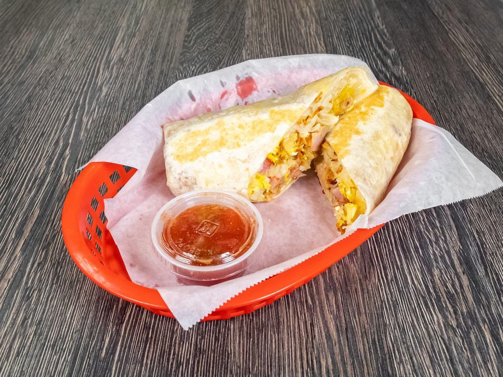 Breakfast Burrito · Eggs, cheese, choice of bacon, ham, chorizo or sausage. Add hash browns in burrito for an additional charge.