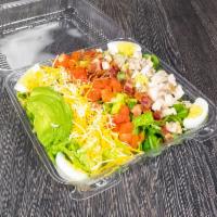 Cobb Salad · Grilled chicken, bacon bits, hardboiled egg, sliced avocado, tomatoes and cheddar Jack.