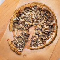 Shroomin Uptown Pie · Crispy cauliflower pizza topped with mushrooms and mozzarella cheese. Comes in 14 inch pie!