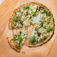 Pesto Attack Pie · Crispy cauliflower pizza topped with cheese and pesto sauce. Comes in 14 inch pie!